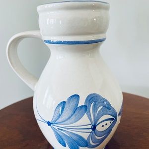 Hand-painted ceramic pitcher/creamer with blue floral motifs, small creamer